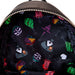 Sac à dos Loungefly Nightmare Before Christmas porté sur le dos, mettant en valeur son design unique et lumineux