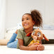 Peluche Disney Valentino tenant une pose assise, idéale pour déco