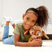 Peluche Disney Wish Valentino dans un environnement enfantin et ludique