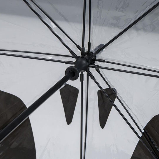 Parapluie fermé montrant le logo officiel Disney et CERDÁ sur la housse de protection