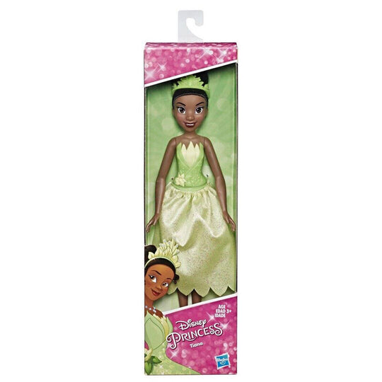 Poupée Tiana HASBRO posée sur fond blanc montrant les détails de la robe et du visage