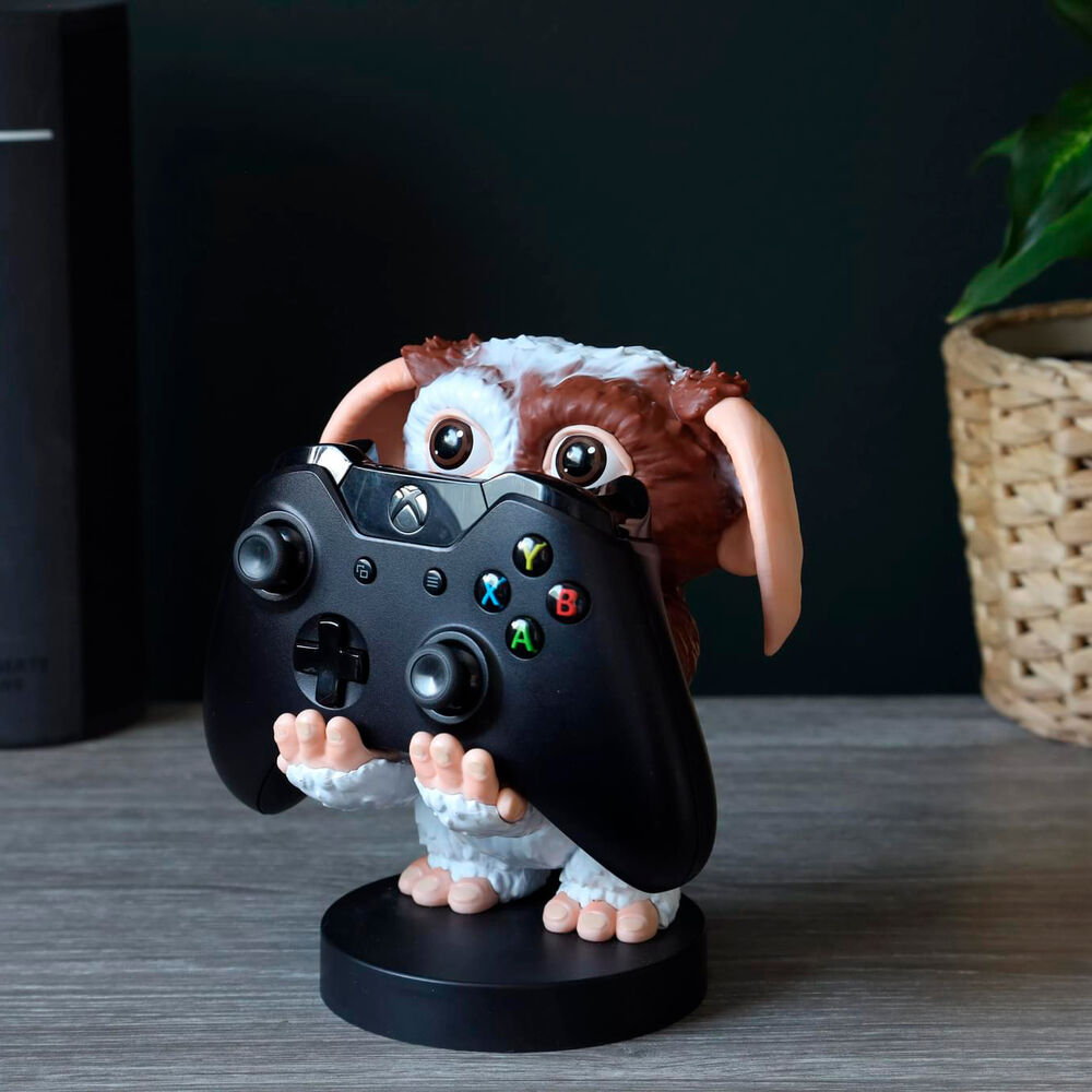 Photo d’ensemble du support Gremlins Gizmo avec plusieurs accessoires de jeu compatibles