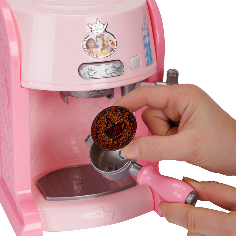 Machine à espresso Disney Princesses en fonctionnement avec vapeur visible