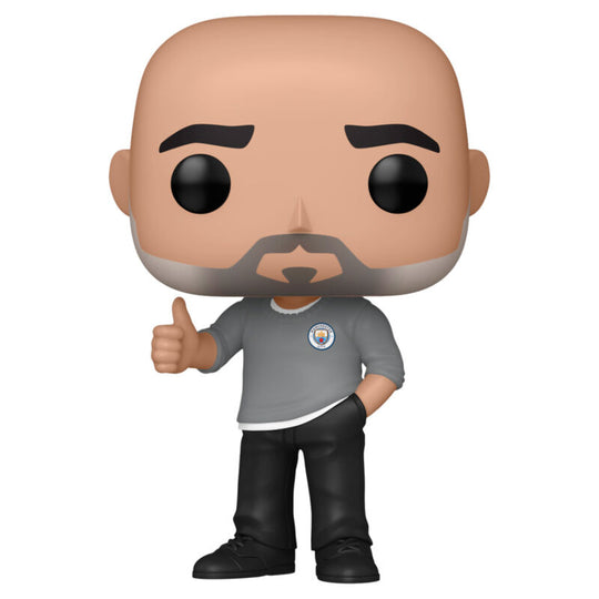 Détail de la figurine Funko POP Pep Guardiola montrant les traits caractéristiques et le logo Manchester City.
