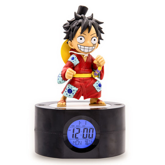 Vue de profil du réveil Luffy TEKNOFUN affichant la température ambiante sur son écran digital lumineux