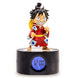 Vue de profil du réveil Luffy TEKNOFUN affichant la température ambiante sur son écran digital lumineux