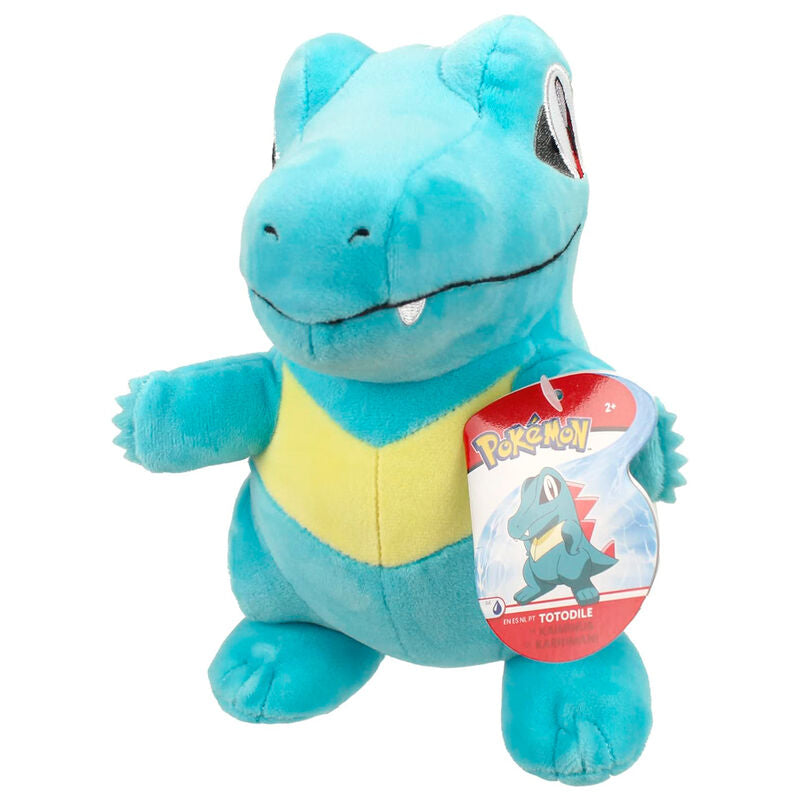 Image de la peluche Totodile JAZWARES montrant sa texture douce et ses couleurs vives sur fond blanc