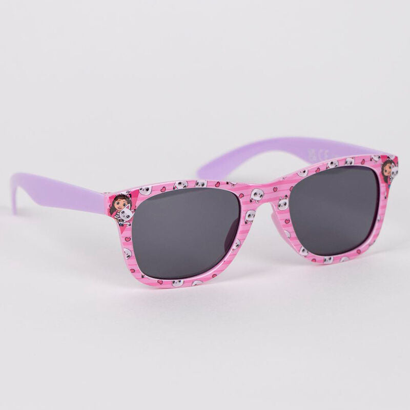Packaging complet du set Gabby Doll House avec accessoires casquette et lunettes