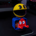 Support clip Pac Man avec manette PlayStation 5 et câble visible à côté