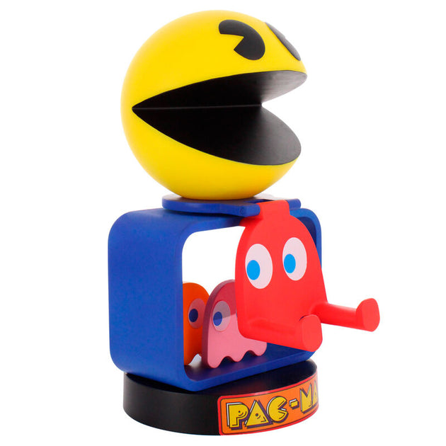 Support Pac Man tenant une manette PlayStation 5 DualSense en charge