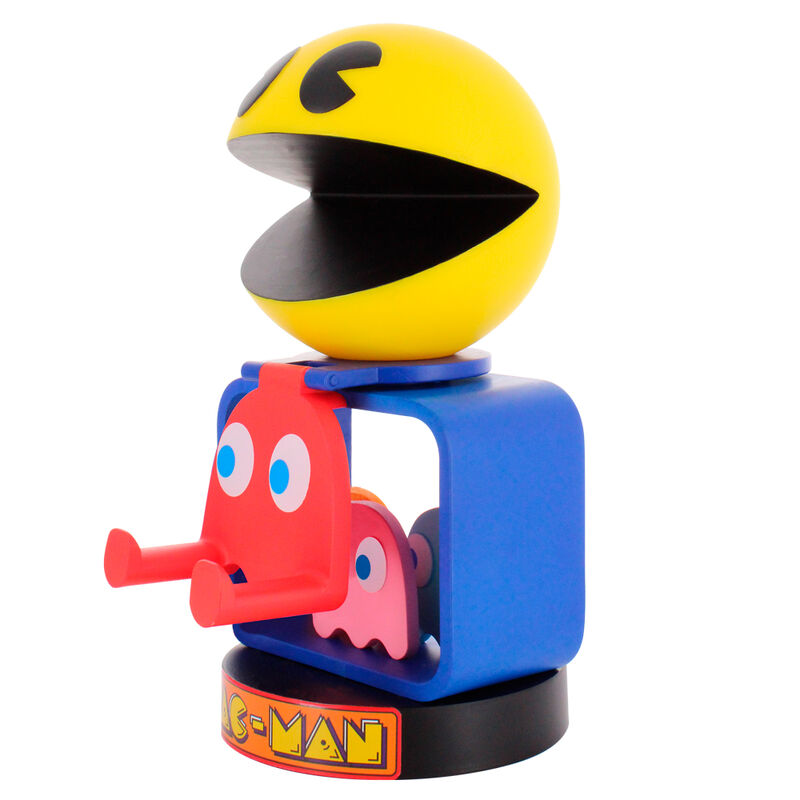 Détail du clip Pac Man fixé sur un bureau avec une manette Xbox Series