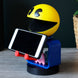 Image du support avec manette et smartphone dans une chambre de gamer