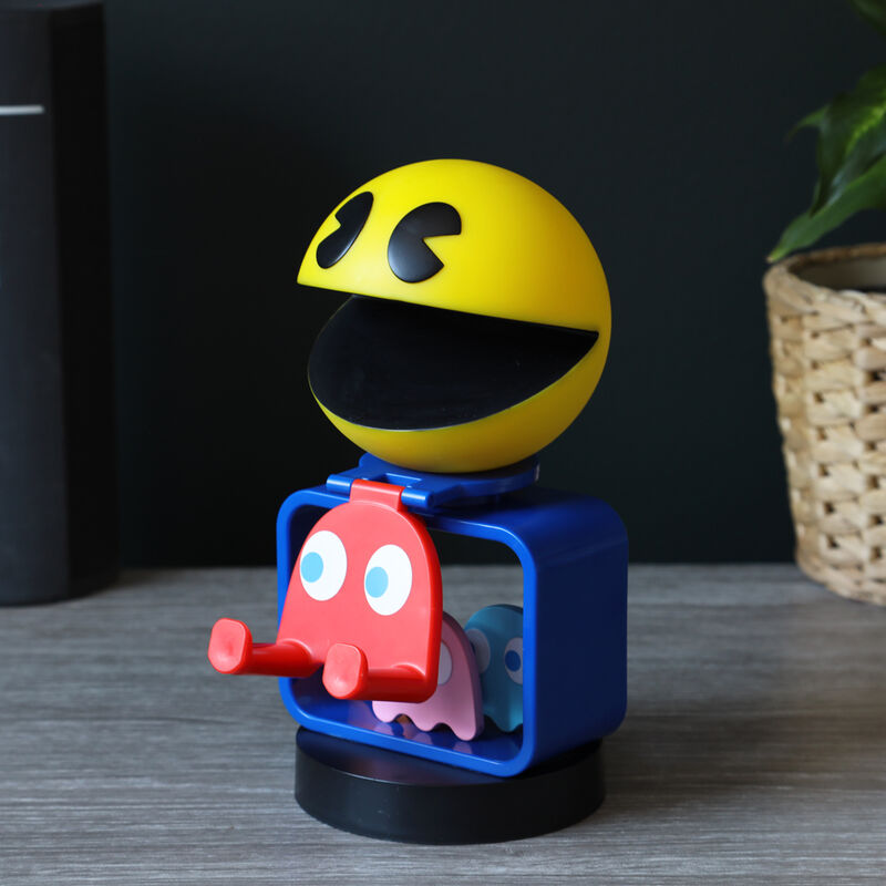 Vue d’ensemble du support clip Pac Man avec accessoires de jeu variés