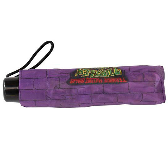 Détail du mécanisme manuel du parapluie pliant Ninja Turtles avec poignée ergonomique