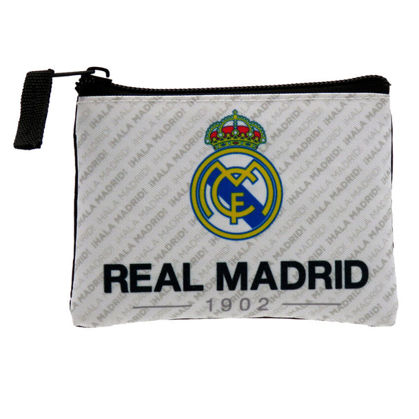 Détail de la fermeture éclair et texture de la pochette Real Madrid signée CYP BRANDS, vue rapprochée.