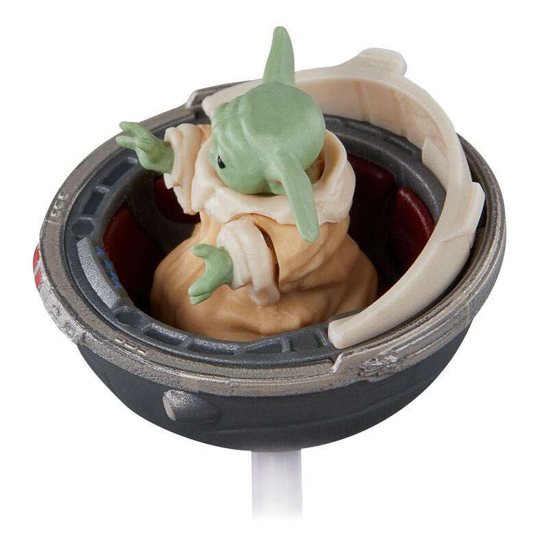 Vue latérale de la figurine Grogu montrant l'articulation des bras et des jambes