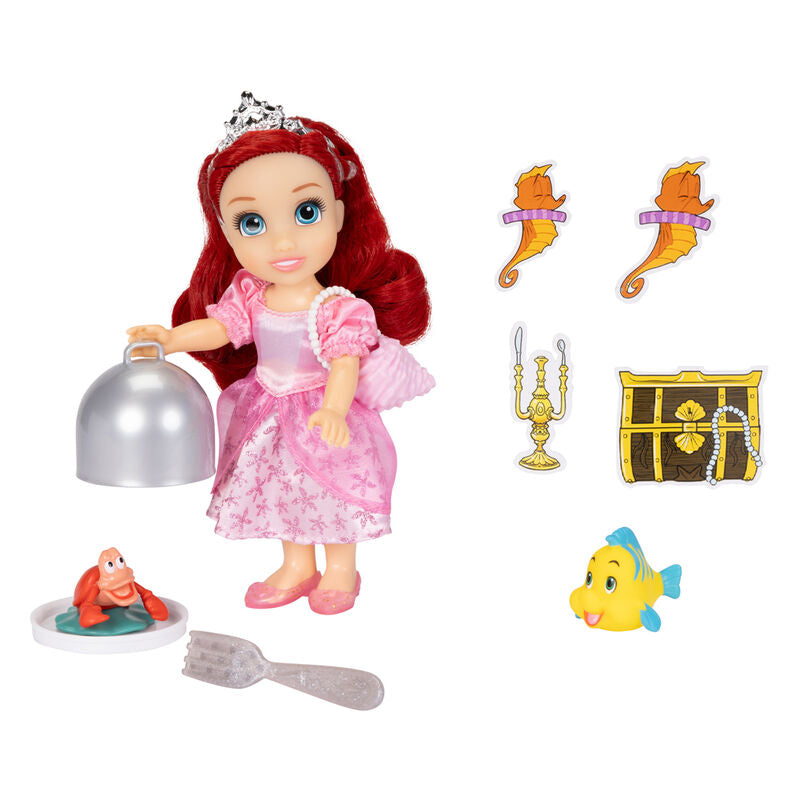 Accessoires inclus pour changer Ariel en sirène ou princesse, présentés sur fond blanc