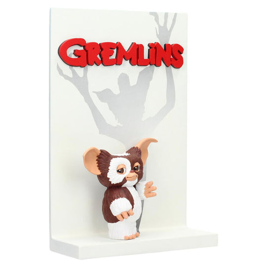 Profil gauche de la figurine Gremlins Gizmo montrant les textures réalistes des oreilles