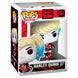 Vue latérale de la figurine Funko POP Harley Quinn avec bat, montrant les détails précis du vinyle et la boîte collector