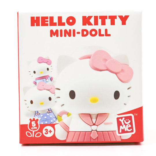 Ensemble de figurines Hello Kitty colorées de 5cm exposées sur une table claire