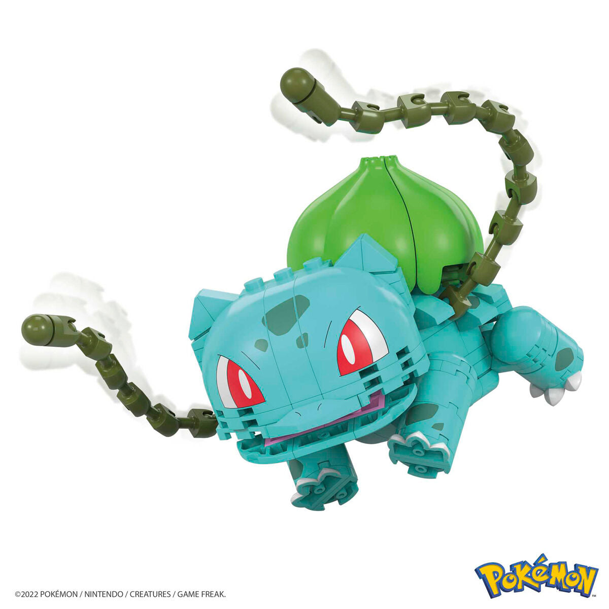 Photo de la figurine Bulbasaur en position de combat avec effets végétaux visibles sur les blocs.