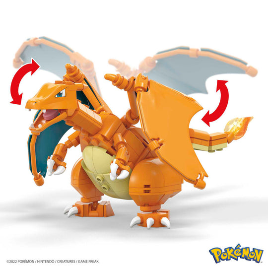 Enfant assemblant le set Mega Construx Charizard, concentré et enthousiaste