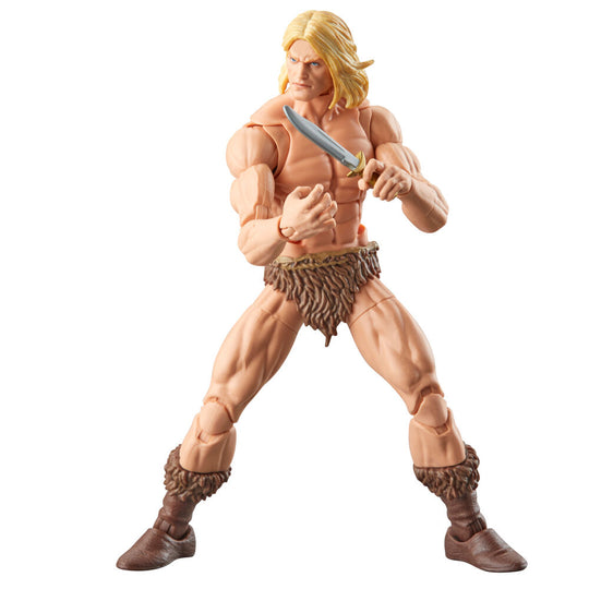 Figurine Ka-Zar posée debout avec accessoires disposés autour