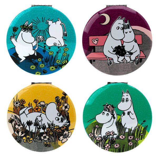 Détail du miroir Moomin montrant la finition en aluminium et la surface en verre réfléchissant
