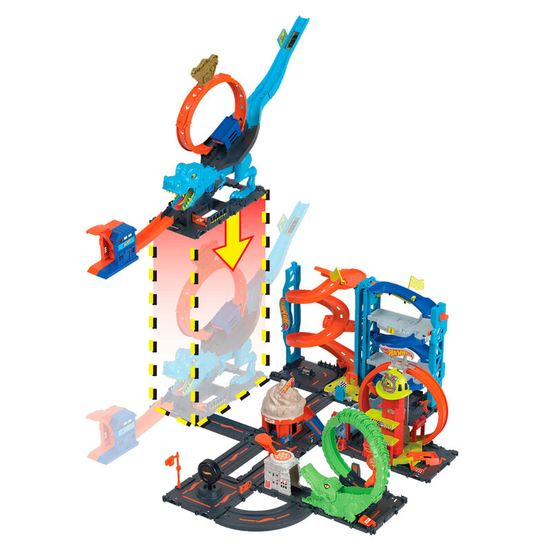 Enfant jouant avec le circuit Hot Wheels T-Rex Chomp Down dans une chambre