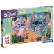 Puzzle Disney Stitch maxi 60 pièces assemblé montrant le personnage Stitch dans un décor coloré et lumineux
