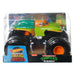 Enfant tenant un Hot Wheels Monster Truck prêt à démarrer une course.