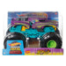 Hot Wheels Monster Truck orange avec signature d'attaque visible sur le côté.