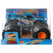 Hot Wheels Monster Truck noir avec roues renforcées prêt à écraser les obstacles.