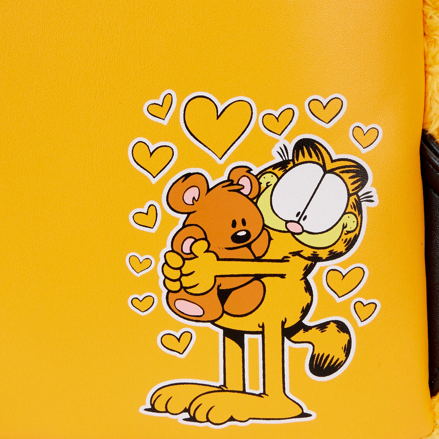Intérieur du sac à dos Garfield Loungefly montrant la doublure assortie et les compartiments