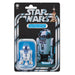 Figurine R2-D2 posée sur un fond neutre montrant ses détails précis