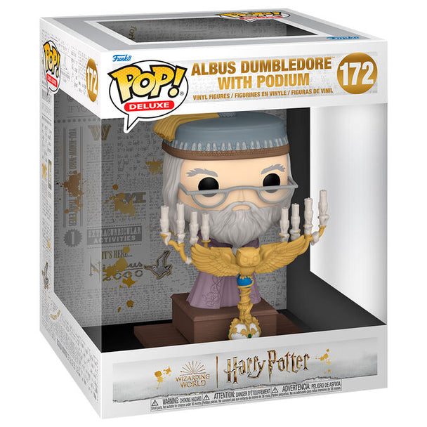 Figurine Funko POP Deluxe de Dumbledore avec son podium tirée du film Harry Potter et le Prisonnier d'Azkaban, vue de face dans sa boîte cadeau.