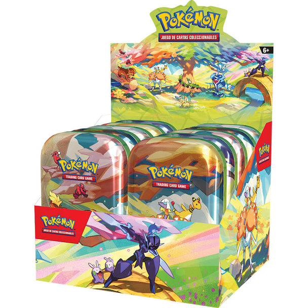 Cartes Pokémon colorées en espagnol étalées sur une surface blanche