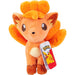 Détail de la peluche Vulpix montrant sa texture en peluche et ses traits fidèles