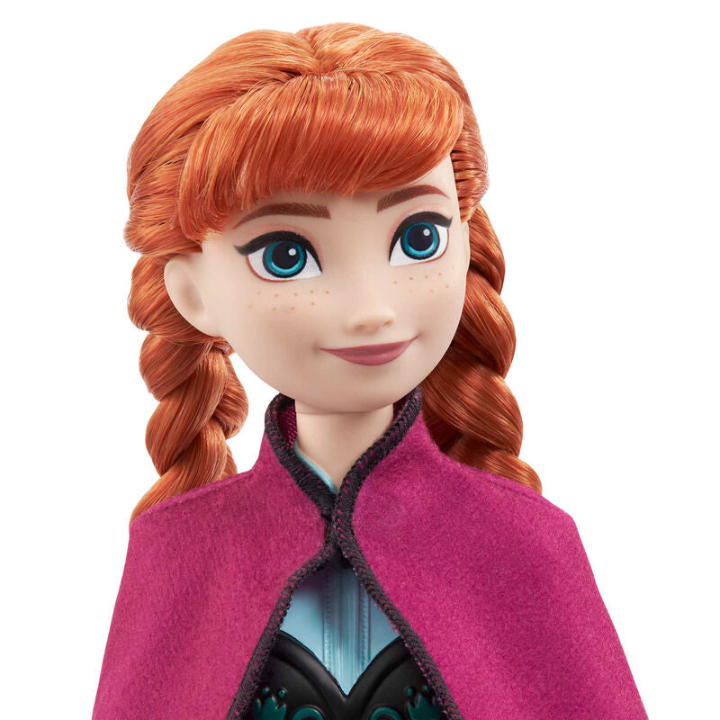 Vue latérale de la poupée Anna Disney Frozen montrant son articulation et accessoires