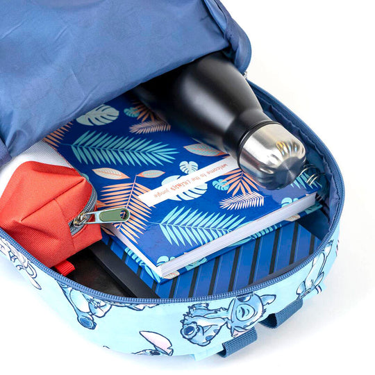 Vue latérale montrant la profondeur de 9 cm et les bretelles ajustables du sac à dos Stitch