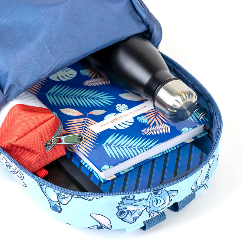 Vue latérale montrant la profondeur de 9 cm et les bretelles ajustables du sac à dos Stitch