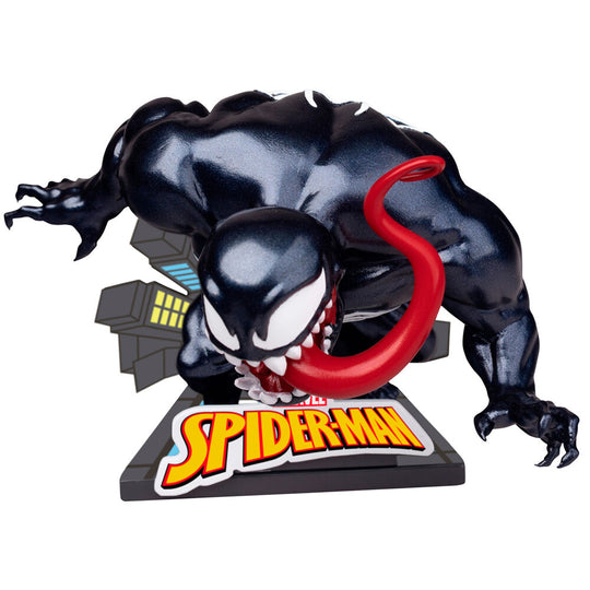 Comparaison de taille entre la figurine Spider-Man et une pièce de monnaie