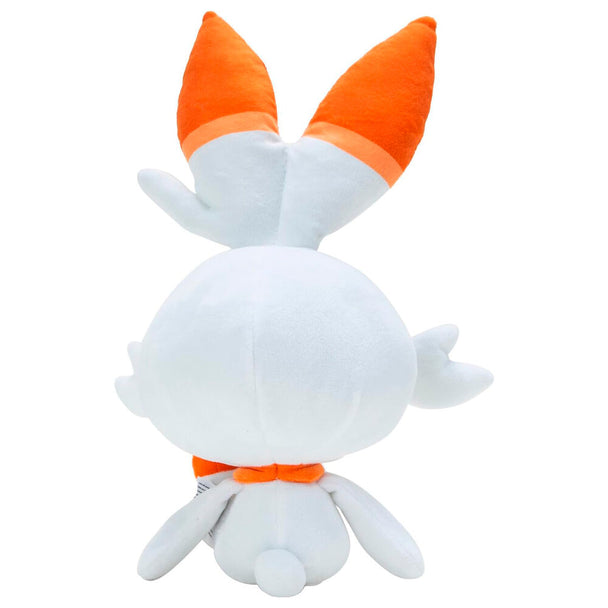 Détail sur le visage souriant de la peluche Scorbunny JAZWARES, montrant ses yeux et oreilles