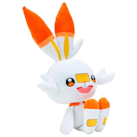 Vue latérale de la peluche Scorbunny Pokémon de 30 cm, exposant sa silhouette et ses pattes