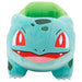 Gros plan sur le visage souriant de la peluche Bulbizarre officielle JAZWARES
