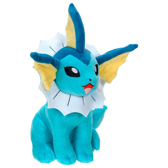 Zoom sur la tête de la peluche Vaporeon montrant ses yeux et oreilles caractéristiques