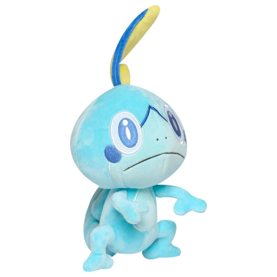 Peluche Sobble Pokémon de 20cm présentée de profil, montrant la qualité des matériaux doux et les finitions soignées