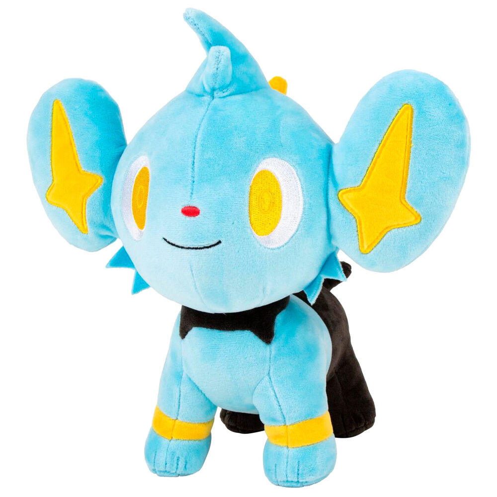 Peluche Shinx assise sur un fond blanc, illustrant sa taille et sa texture douce