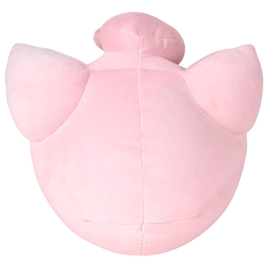 Vue latérale de la peluche Jigglypuff endormi montrant ses bras repliés et son expression paisible
