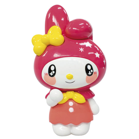 Figurine Hello Kitty COMANSI 6 cm tenant un petit accessoire rose, photo prise de côté